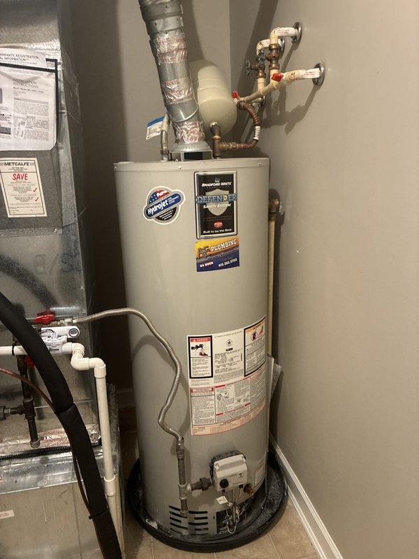 Responded to no hot water complaint following recent water heater installation. Upon arrival, inspected newly installed gas water heater and associated plumbing connections in utility room. Verified all copper supply lines, flexible connectors, and shut-off valves were properly installed and secured. Checked gas supply line connections and confirmed proper venting through metallic flex duct to ensure safe exhaust operation. Identified issue with water heater operation and restored hot water service to residence. All connections tested and verified leak-free, unit now functioning as designed.