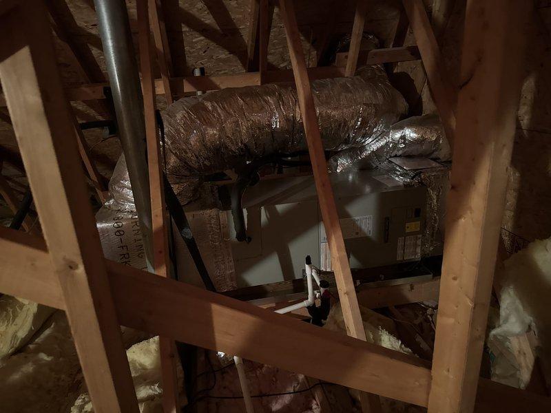 Completed full HVAC system replacement including removal and disposal of existing equipment. Installed American Standard 2.5-ton 14 SEER heat pump (model 5A6H4030A1000A) with matching air handler (model 5TEM4B03AC31) and 10kW electric heat pack. Mounted outdoor unit on pressure-treated wood platform, replaced outdoor disconnect and electrical whip, and fabricated metal duct transitions to adapt new equipment to existing ductwork. Reused existing electrical connections and condensate lines where applicable. Installed 14x30x1 filter grille and Honeywell digital WiFi thermostat for system control. System tested and operational upon completion.
