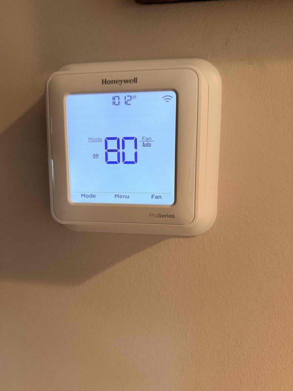 Conducted comprehensive assessment of existing HVAC system for complete replacement. Documented current equipment configuration including attic-mounted air handler unit and Honeywell ProSeries digital thermostat. Evaluated ductwork condition, electrical connections, and system accessibility to provide accurate replacement estimate and specifications for new system installation.