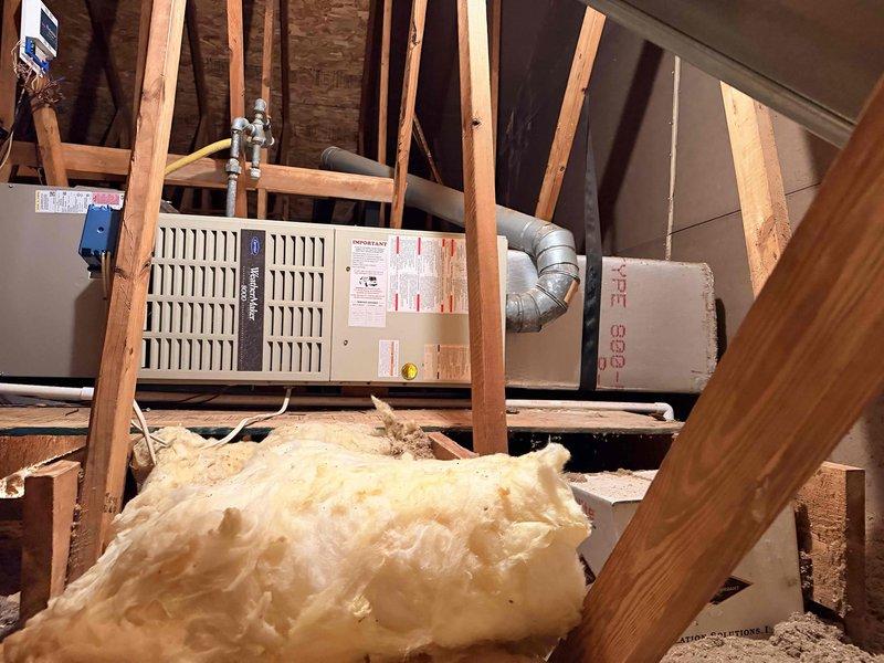 Conducted comprehensive assessment of existing HVAC system for complete replacement. Documented current equipment configuration including attic-mounted air handler unit and Honeywell ProSeries digital thermostat. Evaluated ductwork condition, electrical connections, and system accessibility to provide accurate replacement estimate and specifications for new system installation.