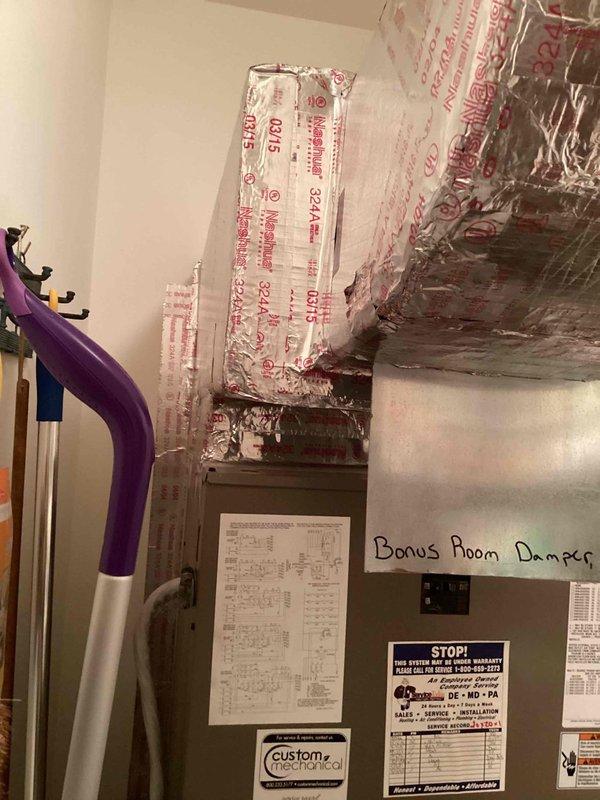 Responded to no cooling call for downstairs unit. Upon arrival, accessed attic-mounted air handler and inspected system components, including bonus room ductwork and damper configuration. Documented equipment measurements and system layout, verified proper damper positioning, and photographed installation for service records.
