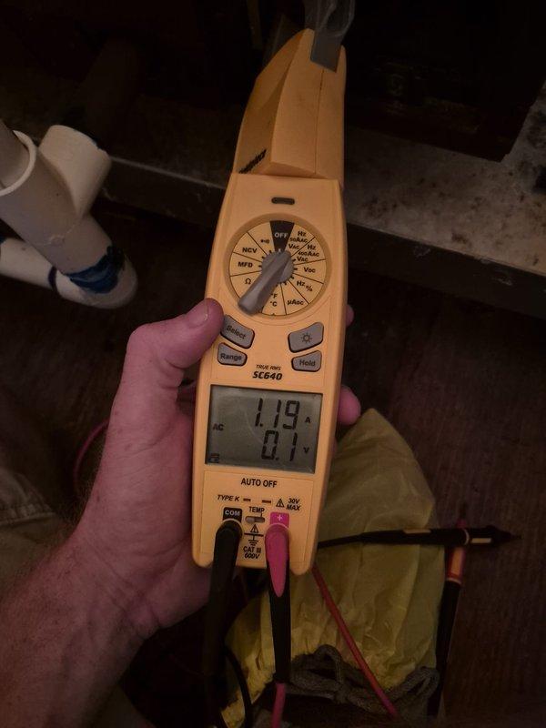 Completed routine heating system maintenance visit and performed comprehensive diagnostic testing. Used clamp meter to verify electrical readings, measuring 0.54 amps and 0.2 volts at the HVAC unit, and confirmed 119V supply voltage with proper amperage draw of 41 amps at the main system components. All electrical connections, blower assembly, and system wiring inspected and found operating within normal parameters.