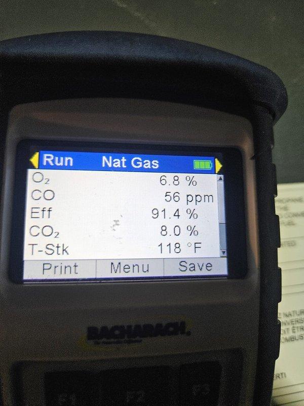 Completed preventive maintenance heating visit on natural gas heating system. Performed combustion analysis using diagnostic equipment, which revealed optimal operating parameters: oxygen level at 6.8%, carbon monoxide at 56 ppm, efficiency at 91.4%, carbon dioxide at 8.0%, and stack temperature at 118°F. All readings confirmed system is operating within manufacturer specifications and safe operating limits.