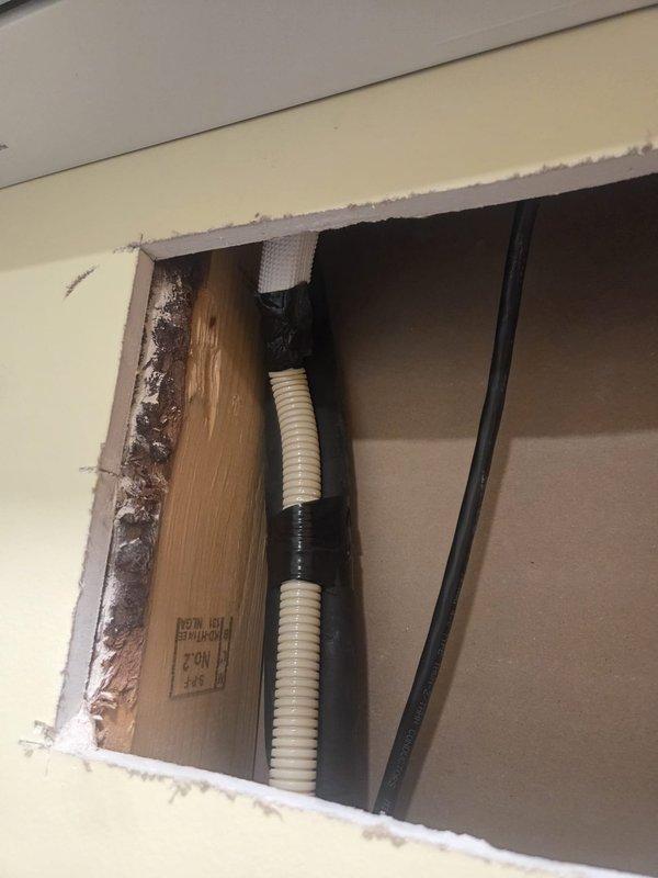 Returned to property after drywall in laundry room was removed to access mini split drain line. Located and corrected kink in drain line that was preventing proper drainage. Installed approximately 25 feet of new mini split drain line to ensure proper condensate removal and system operation.