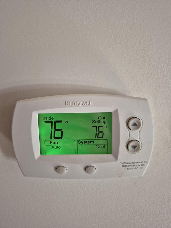 Performed comprehensive heating system maintenance and combustion analysis on HVAC unit. Conducted efficiency testing using Bacharach combustion analyzer, recording optimal performance parameters: oxygen level at 9.9%, carbon monoxide at 6 ppm (well within safe limits), system efficiency at 90.5%, carbon dioxide at 7.3%, and stack temperature at 119°F. Verified Honeywell thermostat operation and calibration, confirming proper temperature display and control functions. All system components operating within manufacturer specifications with no deficiencies noted.