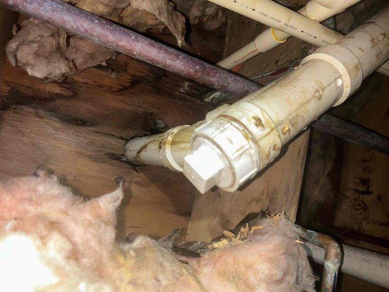 Completed preventive maintenance cooling visit on geothermal HVAC system. Inspected system components including PVC condensate drainage lines, ductwork, and structural supports in attic space. Verified proper insulation placement around mechanical components and confirmed all accessible piping connections showed no active leaks, though noted age-related corrosion on metal piping that will require monitoring during future visits.