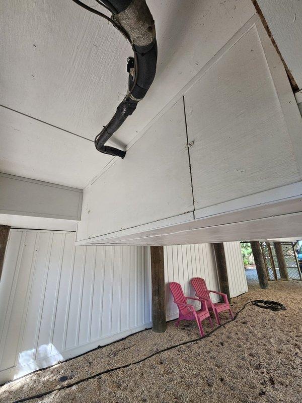 Completed comprehensive tune-up and inspection of residential HVAC system located on exterior wooden platform beneath elevated deck structure. Performed standard maintenance procedures including inspection of outdoor condensing unit, refrigerant line set, electrical connections, and ductwork routing. System found to be operating within normal parameters with no immediate repairs required at time of service.