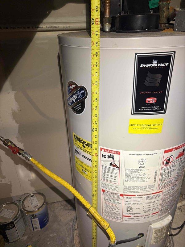 Completed scheduled cooling maintenance visit as part of recurring service agreement. Upon arrival, customer requested rescheduling of appointment, which was accommodated for a later date. Documented existing plumbing infrastructure and water heater installation in utility area, including Bradford White water heater with proper safety labeling and flexible gas line connection. All mechanical systems and utility connections photographed for service records.