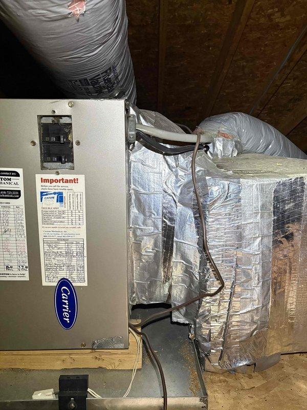 # HVAC Maintenance - Heating System

Completed comprehensive heating maintenance visit on Carrier air handler unit located in attic space. Performed thorough system inspection including visual assessment of equipment condition, ductwork connections, and condensate drain lines. All components found to be in proper working order with secure mounting, intact insulation on flex ductwork, and clear PVC drain lines. System operational and ready for heating season.
