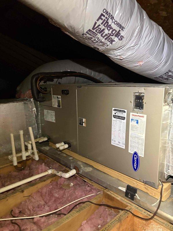 # HVAC Maintenance - Heating System

Completed comprehensive heating maintenance visit on Carrier air handler unit located in attic space. Performed thorough system inspection including visual assessment of equipment condition, ductwork connections, and condensate drain lines. All components found to be in proper working order with secure mounting, intact insulation on flex ductwork, and clear PVC drain lines. System operational and ready for heating season.