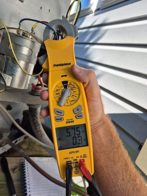 Performed comprehensive system inspection and tune-up on single HVAC unit. Measured supply air temperature at floor register reading 59.1°F and verified outdoor unit electrical performance with readings of 57.9V and 0.3A. Inspected capacitor connections, blower motor assembly, and all electrical components to ensure proper operation and system efficiency.