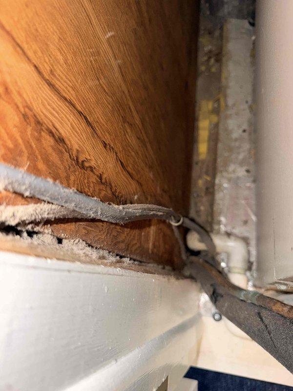 Conducted on-site evaluation for HVAC system replacement in multi-unit condo building where structural work necessitates equipment upgrades. Assessed two identical aging systems located in narrow hallway closets requiring full replacement, and evaluated two additional units that may need temporary disconnection and removal to facilitate foundation piling replacement work beneath the building. Documented existing installations including indoor furnace units in confined utility spaces and outdoor condensing units mounted on cemented stands, photographed equipment conditions and spatial constraints, and provided comprehensive replacement estimate addressing both immediate replacement needs for deteriorated units and contingency planning for temporary system removal during structural repairs.