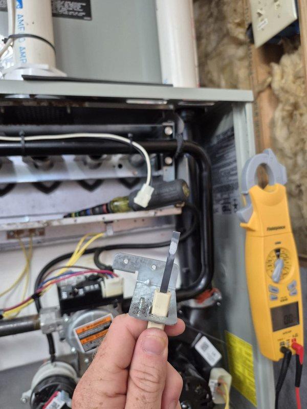 Completed routine cooling maintenance on two HVAC systems. Performed system diagnostics, verified thermostat operation showing 77°F indoor temperature with proper display functionality, and tested electrical components including fuses and safety switches using digital multimeter to ensure proper voltage and continuity. All systems operating within normal parameters.