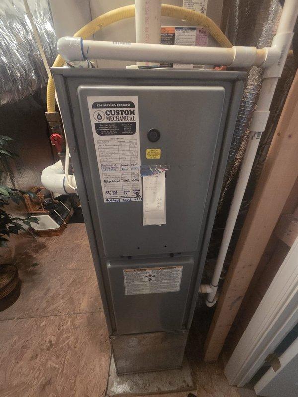 # HVAC Maintenance - Heating System Service

Completed comprehensive preventive maintenance inspection on residential gas furnace system. Performed thorough visual examination of furnace cabinet, burner assembly, and heat exchanger for signs of wear, corrosion, or damage. Verified proper operation of all safety controls including limit switches and flame sensor. Inspected and tested furnace blower motor and capacitor for proper amperage draw and functionality.

Examined condensate drainage system including PVC piping configuration and red gate valve assembly. Confirmed proper drainage flow and verified all pipe connections and fittings are secure without leaks. Checked corrugated condensate drain line for proper pitch and clearance.

Inspected refrigerant line connections and copper piping for proper insulation and secure mounting. Verified all ductwork connections are sealed and insulated appropriately with foil-faced insulation material. Examined flexible duct connections for proper 
