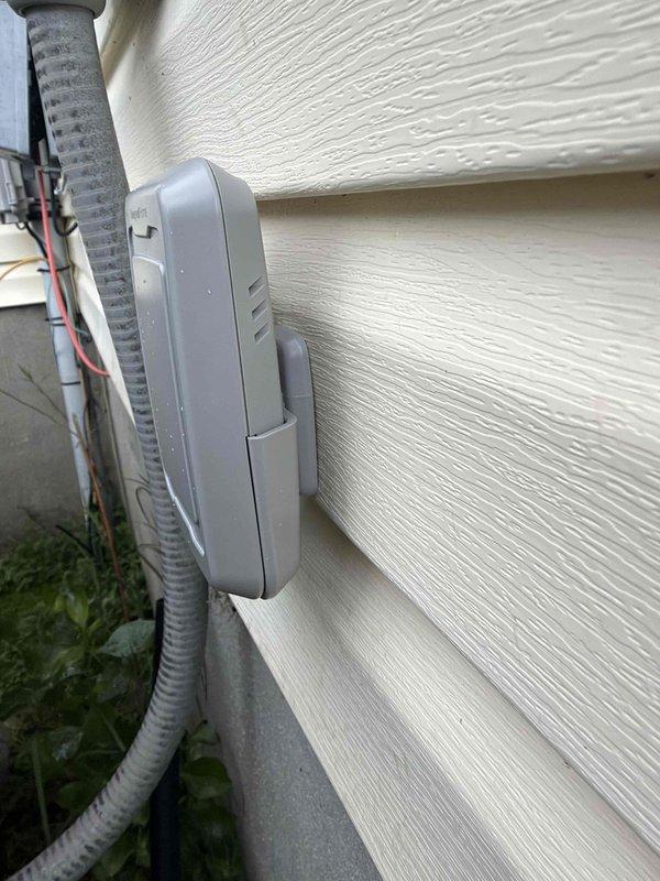 Upgraded existing Honeywell T10 thermostat to a Honeywell RedLink compatible model to enable wireless outdoor temperature sensor functionality. Installed Honeywell wireless outdoor temperature sensor on exterior wall to provide accurate outdoor temperature readings for enhanced HVAC system operation and comfort control. System tested and verified operational upon completion.