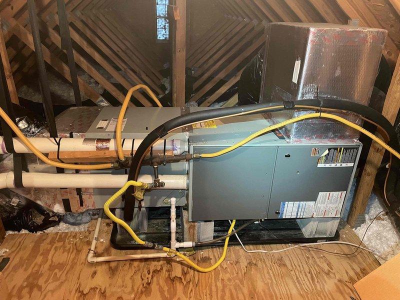 Performed comprehensive heating system evaluation on attic-mounted air handler unit per customer request regarding system longevity and replacement timing. Conducted thorough inspection of all major components including blower motor assembly, control board with associated wiring connections, condensate pump, and drainage system. All electrical connections, ductwork, and operational components were examined and found to be functioning within normal parameters at time of inspection. Provided customer with professional assessment of current system condition and recommendations for future planning based on equipment age and observed wear patterns.