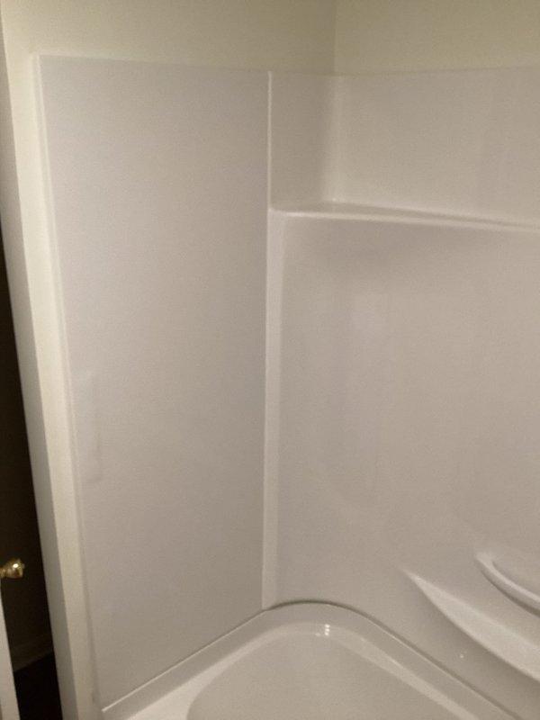 Installed a 50-gallon tall Bradford White water heater with drain pan, two 24-inch stainless steel connectors, expansion tank with brass fittings, and 3/4-inch male high-temperature fitting. Additionally installed two brushed nickel lavatory faucets as per approved quote.