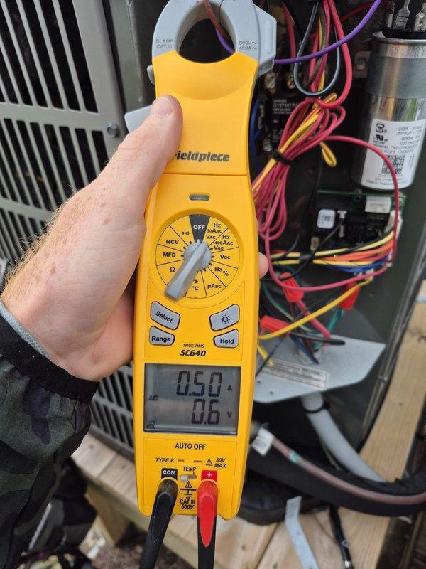 Completed comprehensive heating system preventive maintenance visit. Performed diagnostic testing of electrical components using clamp meter, verified capacitor operation and measured voltage readings to ensure proper system function. Inspected thermostat operation and confirmed cooling setpoint at 75 degrees with normal display function.