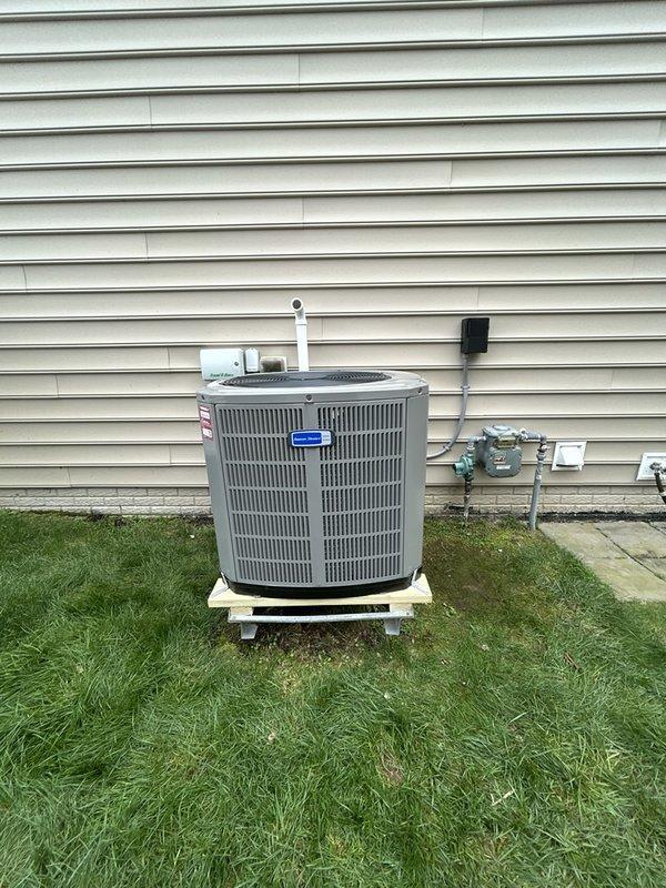 Removed and disposed of existing heat pump and evaporator coil, retaining the existing furnace and thermostat for continued use. Installed new 3-ton, 14 SEER heat pump unit on existing wall bracket with concrete pad placement, along with new evaporator coil matched to system specifications. Flushed existing refrigeration lines to remove contaminants, performed pressure testing to verify system integrity, and recharged lines to manufacturer specifications. Furnished and installed electrical disconnect with whip connection to outdoor unit, incorporating surge protection disconnect due to absence of panel-level surge protection. All equipment tested and confirmed operational upon completion.