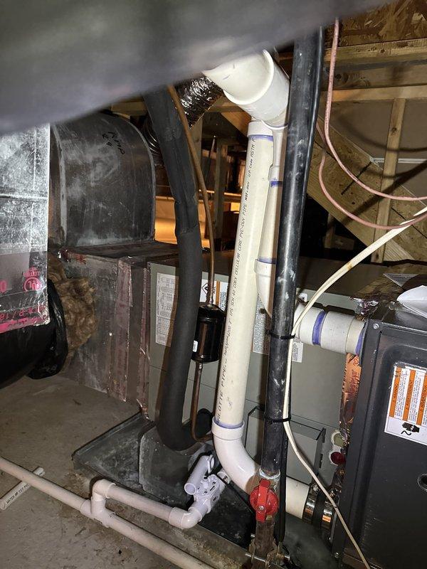 Removed and disposed of existing heat pump and evaporator coil, retaining the existing furnace and thermostat for continued use. Installed new 3-ton, 14 SEER heat pump unit on existing wall bracket with concrete pad placement, along with new evaporator coil matched to system specifications. Flushed existing refrigeration lines to remove contaminants, performed pressure testing to verify system integrity, and recharged lines to manufacturer specifications. Furnished and installed electrical disconnect with whip connection to outdoor unit, incorporating surge protection disconnect due to absence of panel-level surge protection. All equipment tested and confirmed operational upon completion.
