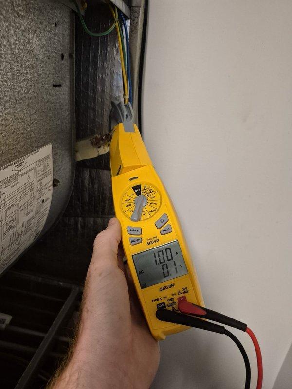 Performed comprehensive cooling system maintenance and diagnostics on residential HVAC unit. Conducted electrical testing using digital multimeter to verify proper voltage and amperage readings throughout the system. Inspected and tested capacitor performance, measuring microfarad values to ensure components were operating within manufacturer specifications. Verified all electrical connections, examined wiring integrity, and confirmed system functionality. Unit operating efficiently with all readings within normal parameters.
