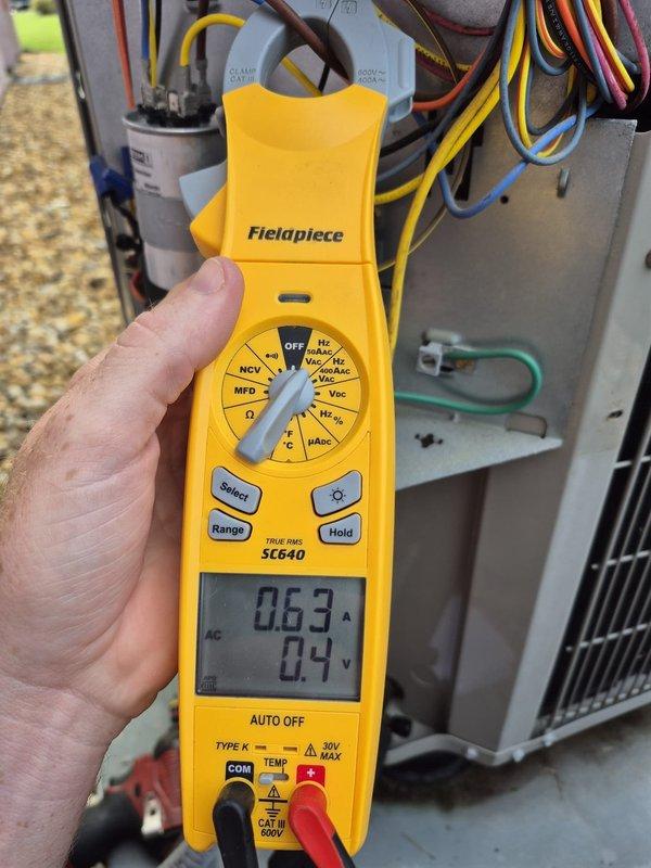 Performed comprehensive cooling system maintenance and diagnostics on residential HVAC unit. Conducted electrical testing using digital multimeter to verify proper voltage and amperage readings throughout the system. Inspected and tested capacitor performance, measuring microfarad values to ensure components were operating within manufacturer specifications. Verified all electrical connections, examined wiring integrity, and confirmed system functionality. Unit operating efficiently with all readings within normal parameters.