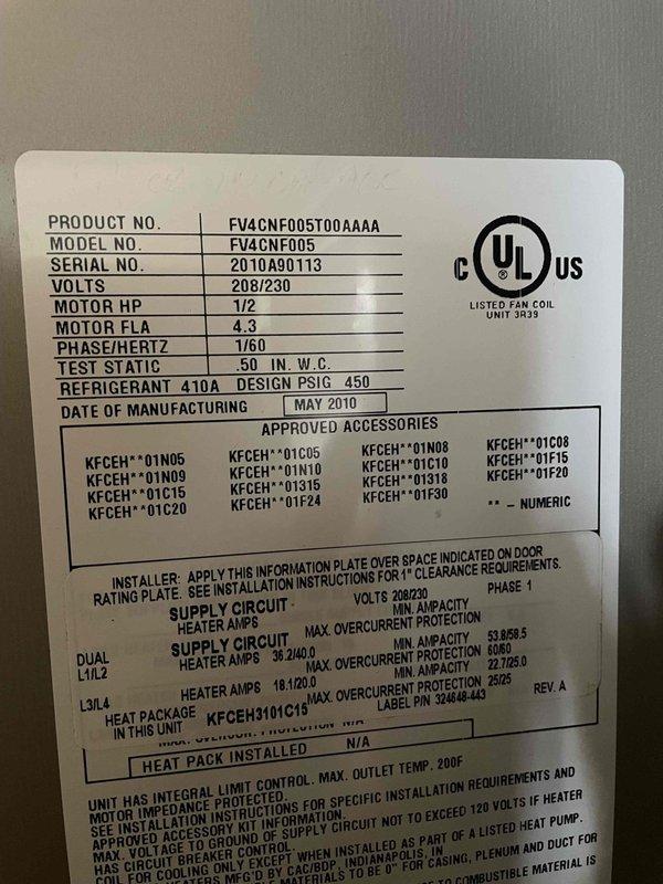 Completed heating maintenance visit on Trane FV4CNF005 fan coil unit manufactured May 2010. System inspection revealed a severely corroded dual run capacitor that was replaced due to extensive rust and oxidation damage compromising functionality. Verified system specifications including 208/230V operation, R-410A refrigerant, and proper electrical parameters; confirmed unit operational following capacitor replacement.
