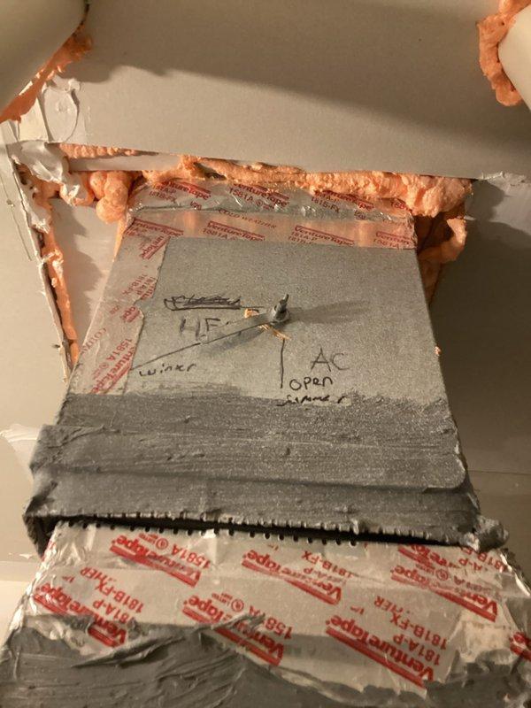 Responded to service call for HVAC system seasonal changeover. Upon arrival, accessed ceiling-mounted duct damper system and manually switched damper positions from cooling mode to heating mode per homeowner's request. Verified Honeywell Home smart thermostat was functioning properly and displaying correct temperature readings. System ready for heating season operation.