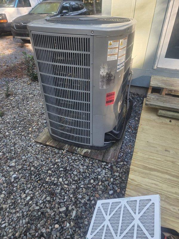 Completed routine heating maintenance visit on residential HVAC system. Inspected outdoor condenser unit, verified proper operation of all components, and replaced air filter. Unit found in good working condition with no immediate repairs required.