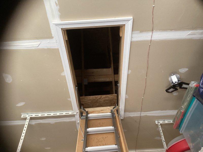Conducted estimate for complete HVAC system replacement for unit located in garage attic space. Existing system is approximately 10 years old and currently operational. Assessed attic access via pull-down ladder, evaluated outdoor condensing unit positioned on concrete pad with proper landscaping clearance, and documented refrigerant line routing along exterior siding. Provided replacement recommendations for aging equipment approaching end of expected service life.