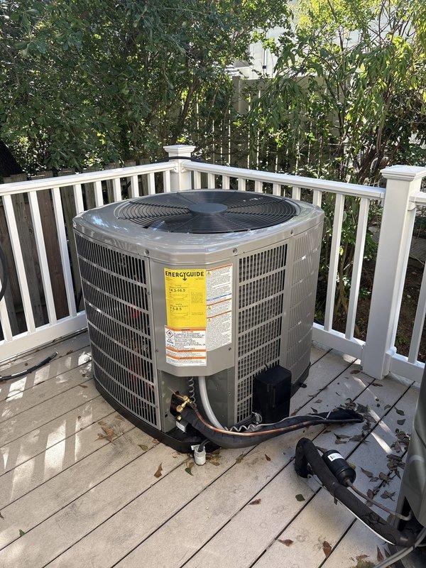 Completed full HVAC system replacement on first floor of two-system residence. Removed and disposed of existing equipment, then installed new 3-ton 15 SEER heat pump outdoor unit (model 5A6H6036) on deck with proper disconnect and whip. Installed variable speed fan coil unit (model 5TEM6D04) with 15KW backup electric heat and breaker, along with 1" filter rack and WiFi-enabled thermostat (model THX1200W). Flushed, pressure tested, and recharged refrigeration lines to manufacturer specifications. Extended equipment warranty coverage for one year.