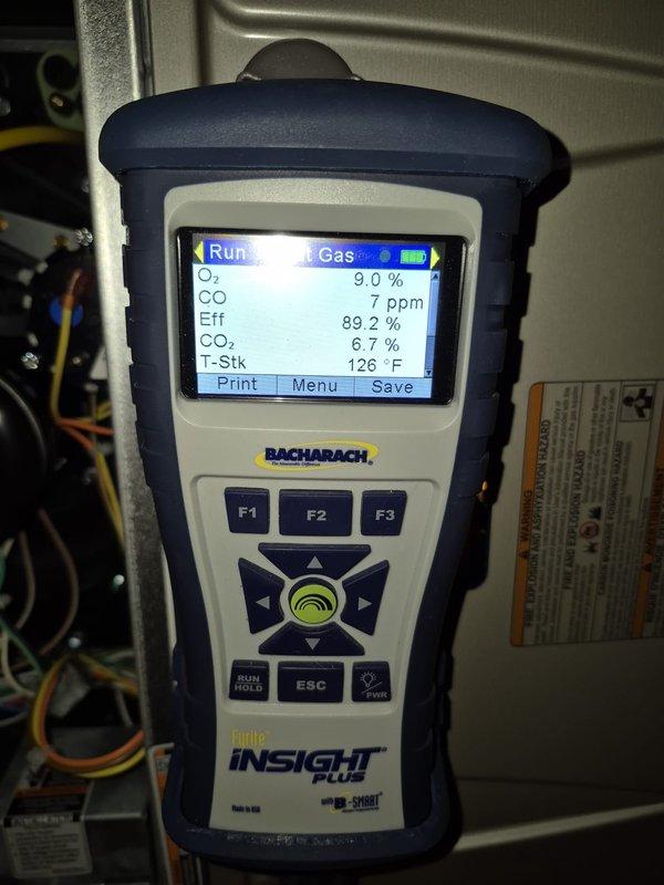 Performed scheduled heating maintenance visit on two HVAC systems. Conducted comprehensive combustion analysis on both units using digital gas analyzer. First system measured CO₂ at 6.7%, stack temperature at 108°F, ambient air at 79.5°F, excess air at 67.8%, and CO at 13 ppm. Second system readings showed O₂ at 9.0%, CO at 7 ppm, efficiency at 89.2%, CO₂ at 6.7%, and stack temperature at 126°F. All combustion parameters within acceptable ranges for natural gas heating equipment. Systems operating safely and efficiently with proper fuel-to-air ratios confirmed.