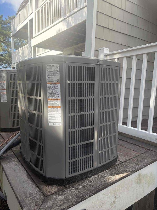 Completed full HVAC system replacement including removal and disposal of existing equipment. Installed American Standard 5A6H4030A1000A 2.5-ton 14 SEER heat pump with matching 5TEM4B03AC31 air handler and BAYHTR1510 10 kw electric heat pack. Fabricated and installed metal duct transitions to adapt new equipment to existing ductwork. Reused existing condensate drain lines while replacing outdoor disconnect and electrical whip to meet current code requirements. Positioned outdoor unit on existing equipment stand and secured all connections. Installed Honeywell TH6320W digital WiFi thermostat for system control. Verified proper refrigerant charge, airflow, and electrical connections. System tested and operating within manufacturer specifications with one-year parts and labor warranty from installation date. Filter installed at air handler unit.