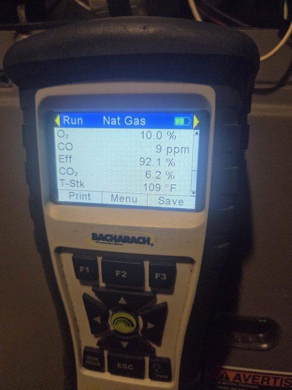 Performed a tune-up and heating inspection on one system, including a combustion analysis on the natural gas furnace that showed 9 ppm CO, 92.1% efficiency, 6.2% CO₂, 10.0% O₂, and a 109°F stack temperature, all within normal operating range. Accessed the attic through the closet hatch to inspect the system and verify proper operation.