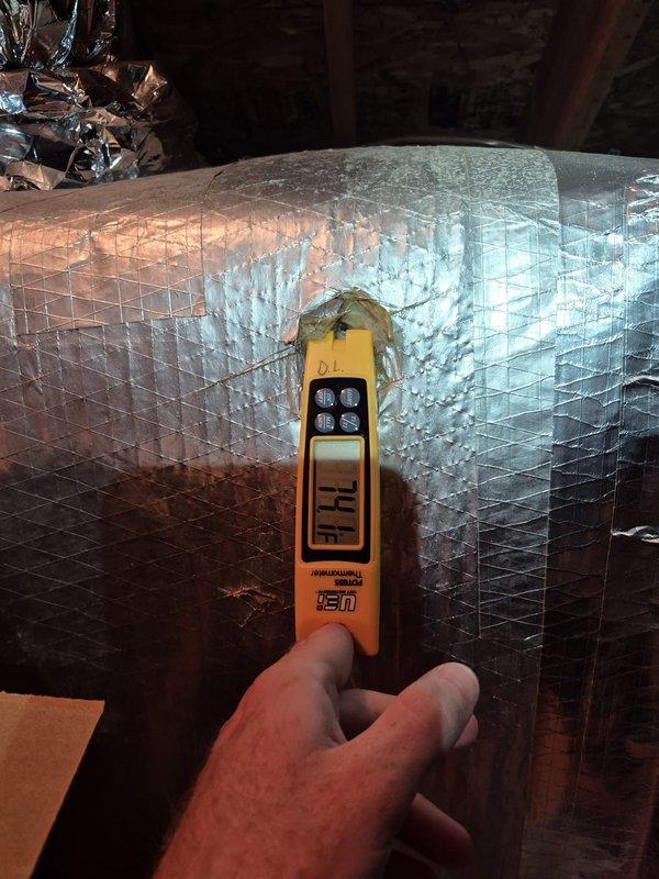Performed a scheduled heating maintenance visit on the air handler, including inspection of the electrical compartment and measurement of blower circuit amperage with a clamp meter to verify normal operating draw. Checked supply duct discharge temperature at the foil-faced insulated trunk using a digital probe thermometer, recording 74.1°F, and inspected the condensate drain pan and PVC drain line for proper condition.