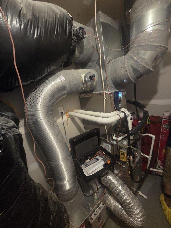 Performed seasonal heating maintenance on the natural gas furnace, including inspection of the ductwork, damper actuators, condensate/PVC venting, and electrical connections. Conducted a combustion analysis with a Bacharach analyzer, recording 4.4% O₂, 9.3% CO₂, 90.4% efficiency, and 126°F stack temperature, with CO within acceptable limits. The system was found to be operating properly, with no visible signs of rust, cracking, or ice.