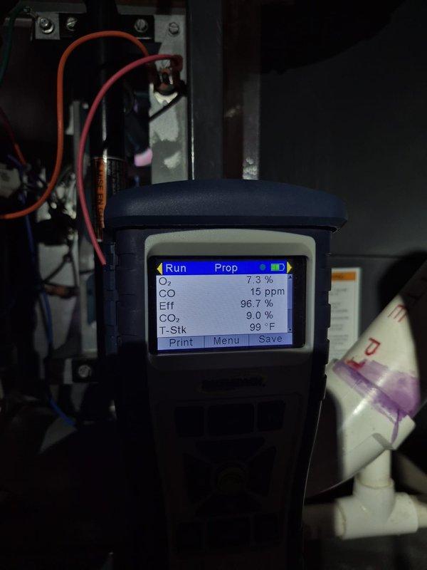 Performed heating system maintenance and verified safe, efficient operation. Combustion analysis on the gas furnace showed O₂ at 7.3%, CO at 15 ppm, CO₂ at 9.0%, stack temperature of 99°F, and 96.7% efficiency, all within normal parameters. Measured current draw at the gas supply line with a clamp meter and inspected the inducer motor, control board wiring, and condensate drain piping to confirm proper system function.