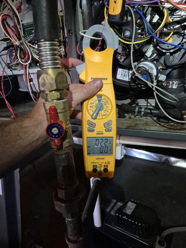 Performed heating system maintenance and verified safe, efficient operation. Combustion analysis on the gas furnace showed O₂ at 7.3%, CO at 15 ppm, CO₂ at 9.0%, stack temperature of 99°F, and 96.7% efficiency, all within normal parameters. Measured current draw at the gas supply line with a clamp meter and inspected the inducer motor, control board wiring, and condensate drain piping to confirm proper system function.