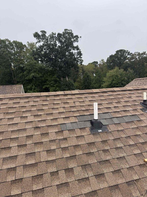 Installed a Rinnai RX199iN tankless water heater with a brass service valve kit, thermal expansion tank, and 3/4" stainless steel flex gas line, with brass fittings and nipples for the water connections. Ran 2" Schedule 40 PVC venting with DWV elbows and replaced the existing oversized roof penetration with a 2" roof boot and new flashing, which restored a weathertight seal at the roof.