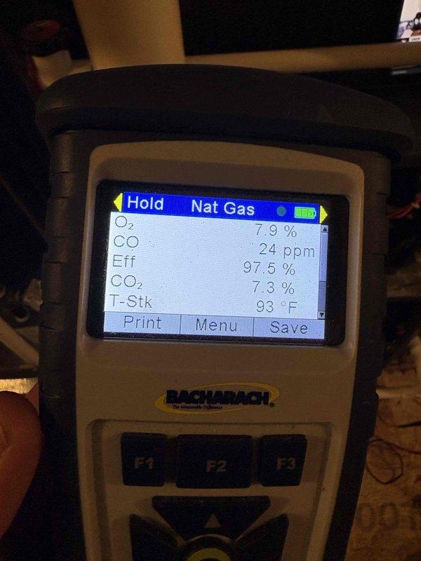 Performed scheduled heating maintenance on a natural gas furnace, including a combustion analysis with a calibrated flue gas analyzer. Readings were within acceptable limits: O2 7.9%, CO2 7.3%, CO 24 ppm, stack temperature 93°F, and combustion efficiency 97.5%, confirming safe and efficient operation. The system was left operating properly.