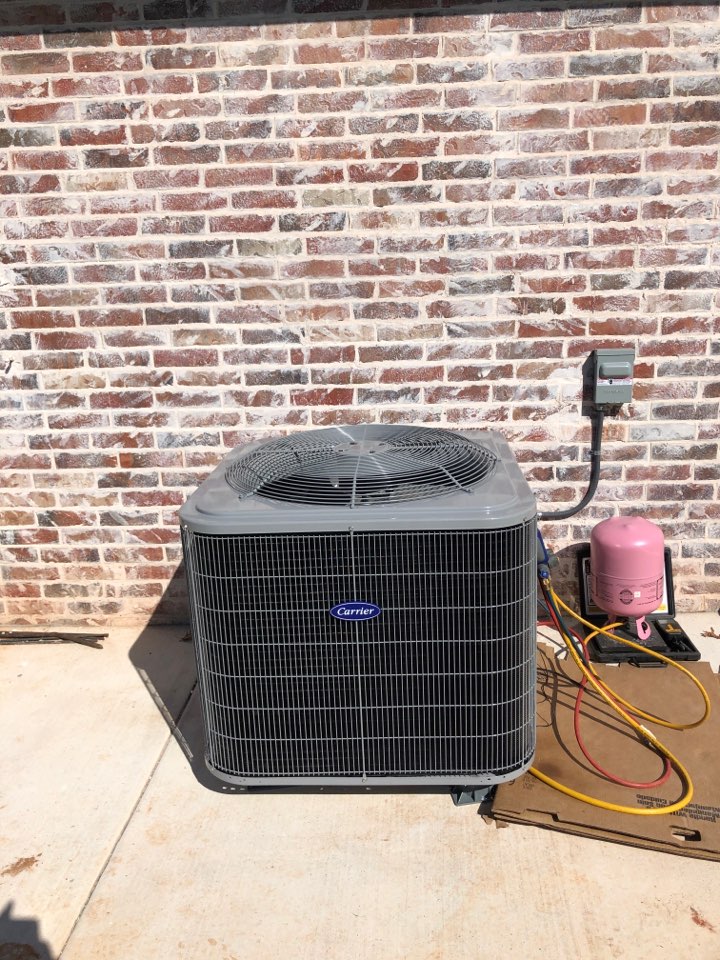 Installing a 3 ton heat pump at a house in Shawnee 