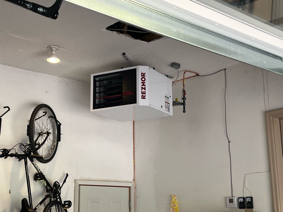 New garage heater! With new gas line & vented through the roof!
