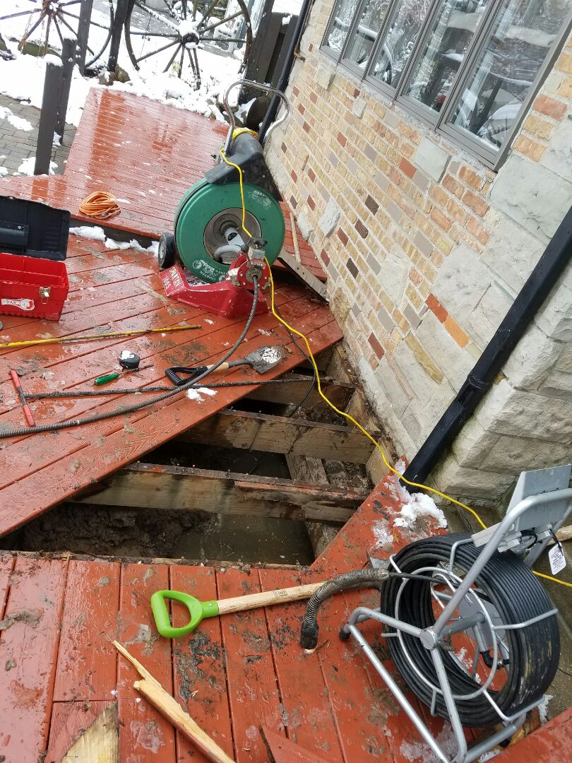 Mainline repair for broken pipe and root intrusion
