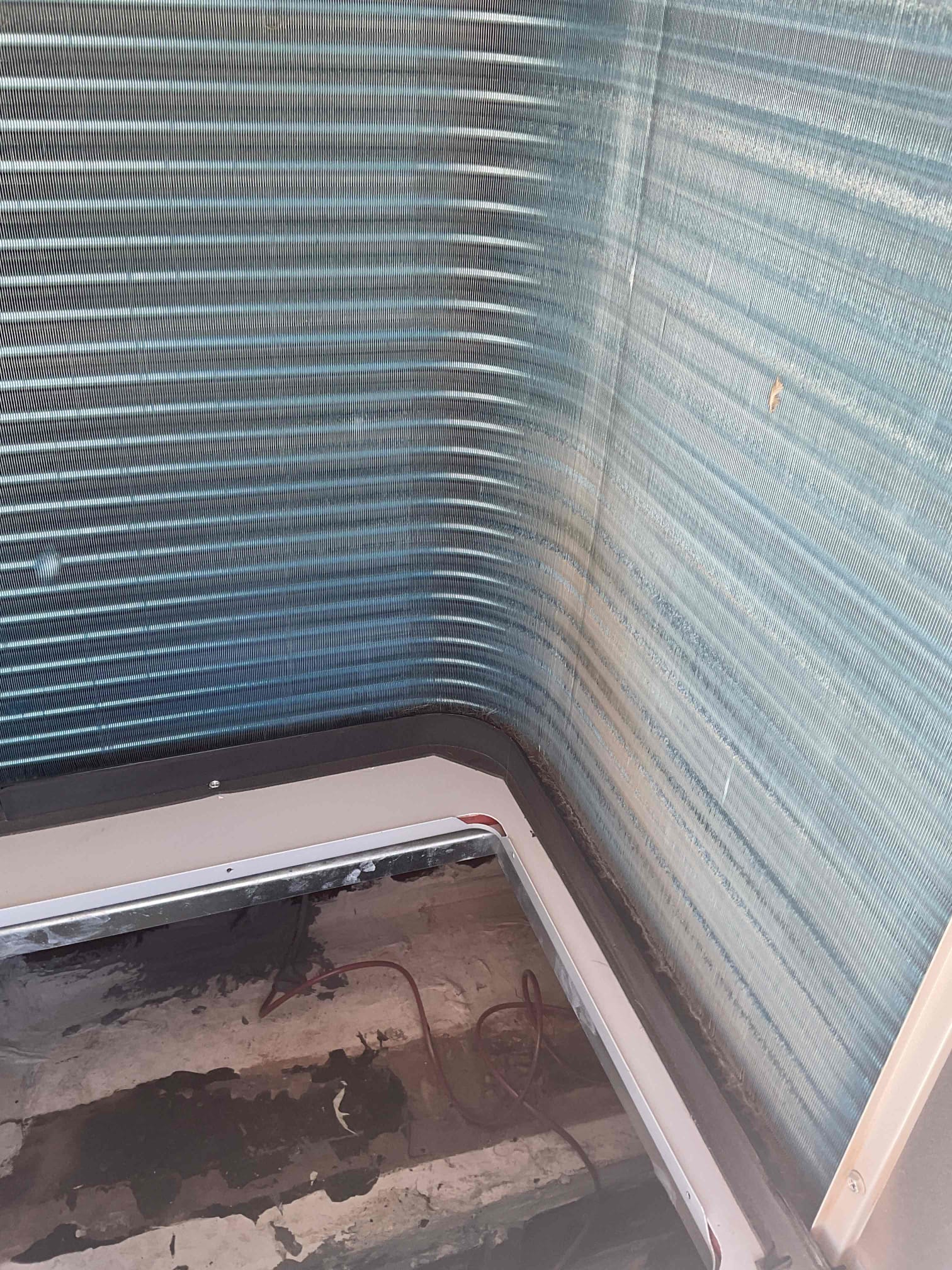 Maintenance and inspection on Bosch heat pump package unit. 