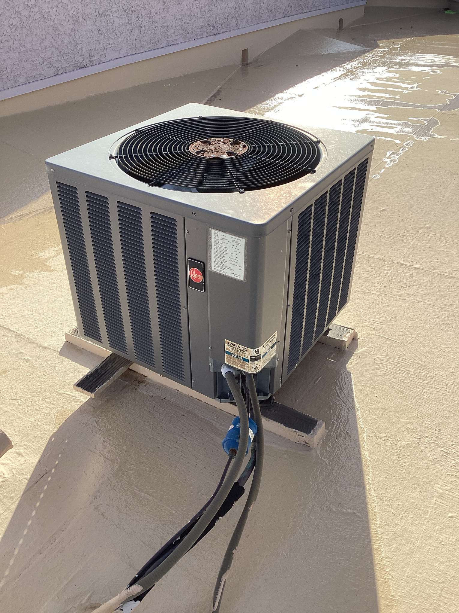 Tech maintenance 13 and 15-year-old Rheem systems