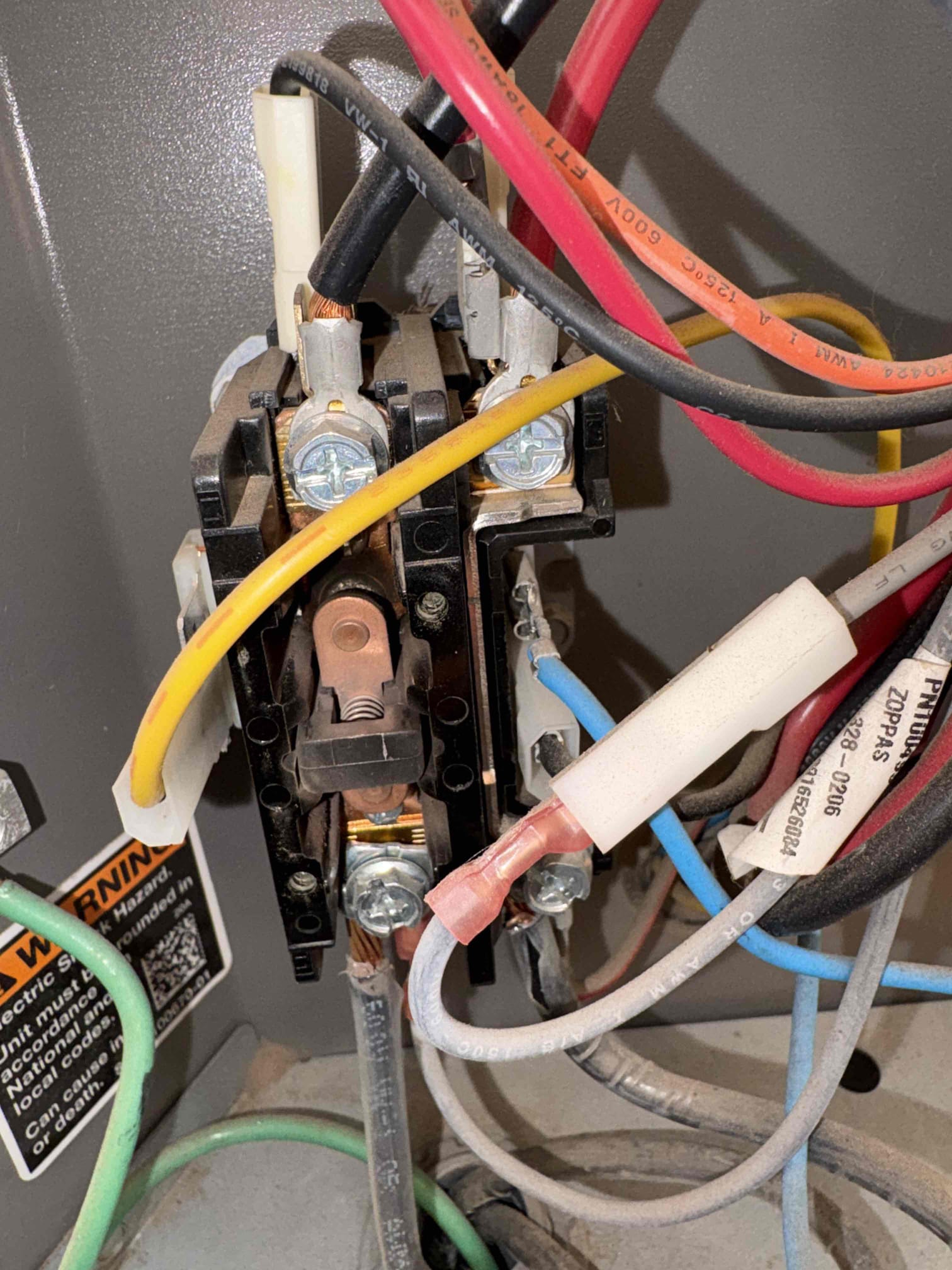 Tech maintenance five-year-old split Lennox furnace