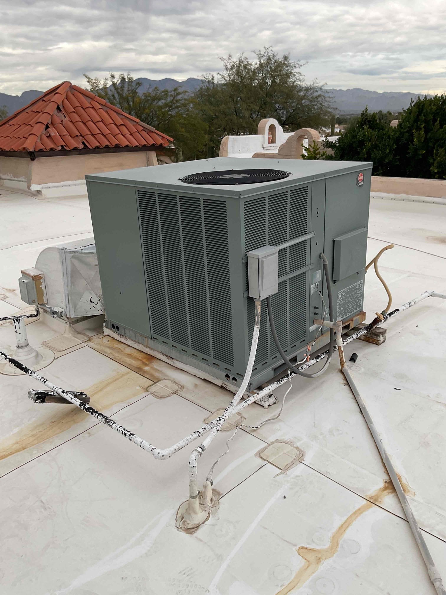 I performed a diagnostic on a 2011 Rheem gas package unit. The safety sensor was failing, which caused the heater to shut off unexpectedly. Additionally, the indoor fan motor was leaking a significant amount of oil, leading to overheating and imminent failure. I identified these issues and provided a detailed report to ensure the system operates safely and efficiently.