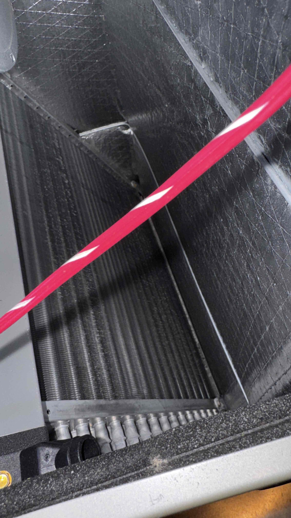 I addressed the hard start issue by inspecting and repairing the necessary components to ensure smooth operation. To prevent future flooding, I thoroughly cleaned and inspected the condensate drain line. Additionally, I meticulously cleaned the ducts and blower wheel to remove accumulated dust and debris, enhancing overall system efficiency and air quality.