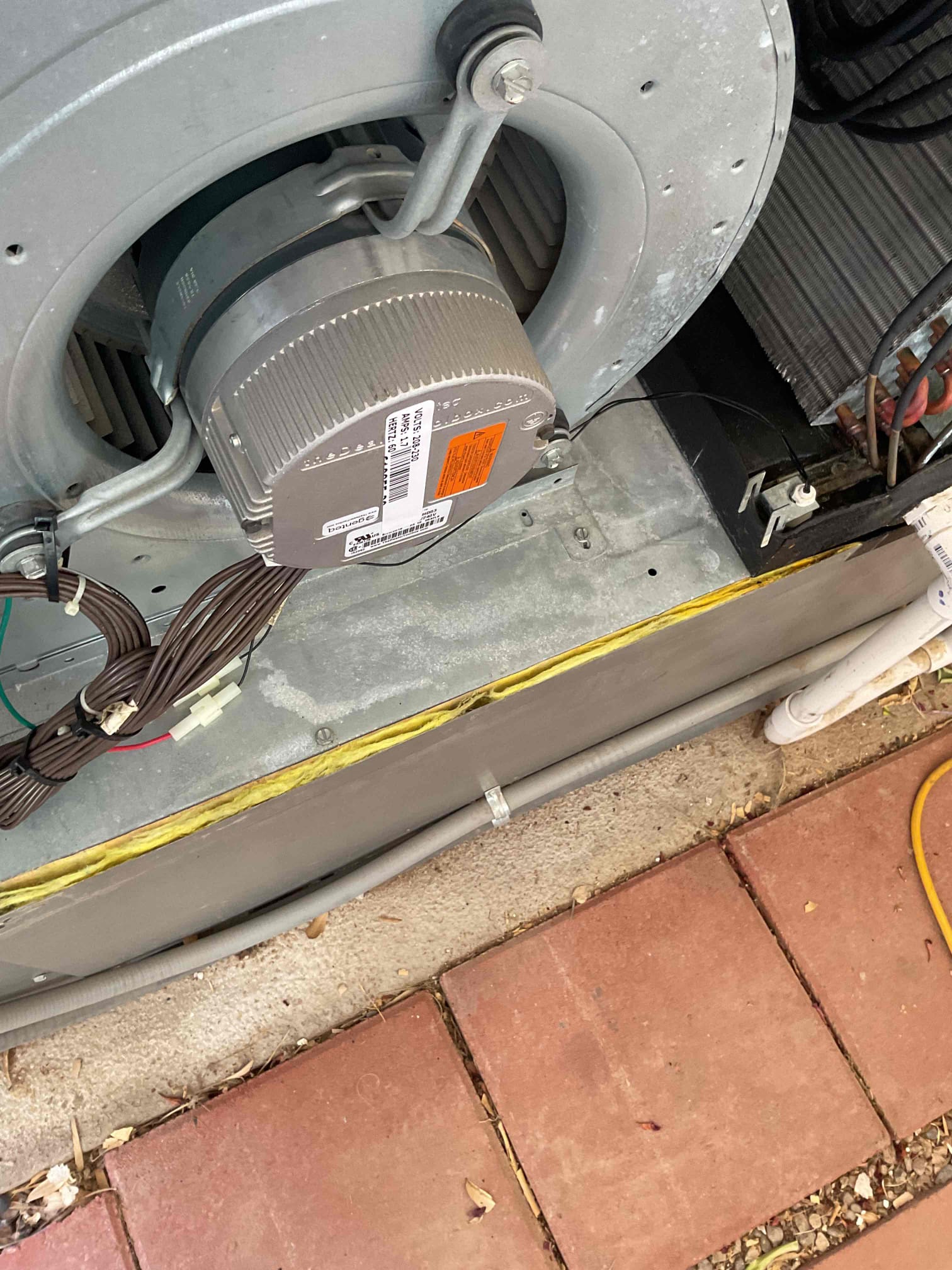 Upon inspection, I found inadequate insulation on the inside of the blower panel door, which was affecting efficiency. Additionally, the thermostat was malfunctioning. The client opted to address both issues. I replaced the faulty insulation and installed a new thermostat, which comes with a lifetime warranty. This upgrade ensures reliable performance and long-term satisfaction. The system should now operate more efficiently and accurately.