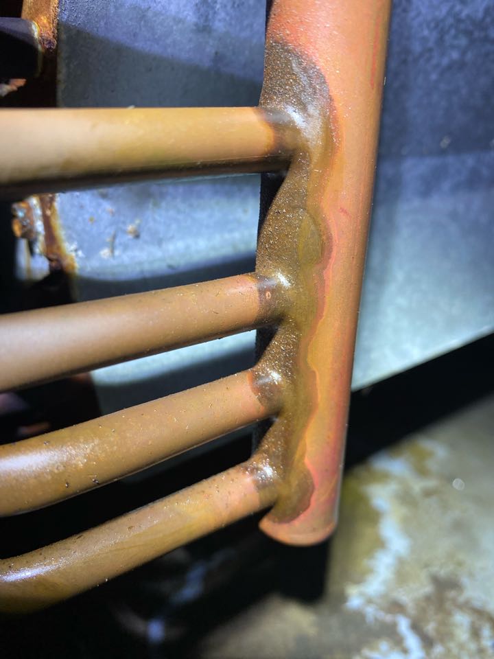 Goodman heat pump rusted pan and leak in coil. 